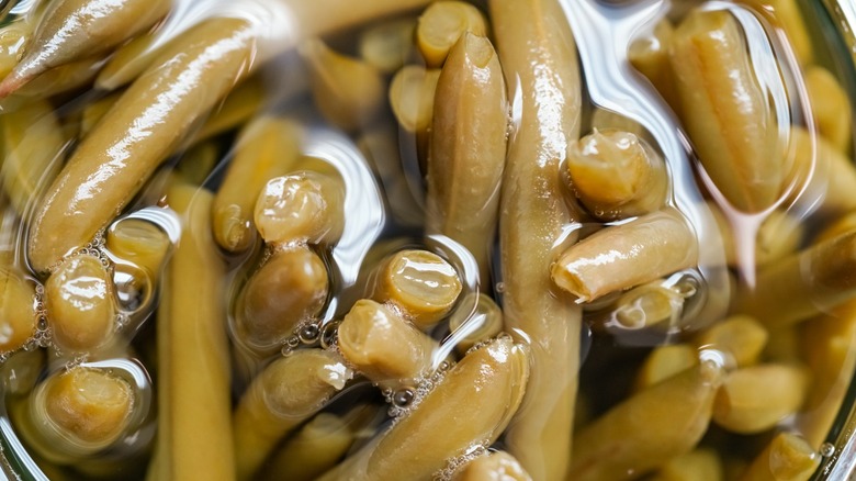 Green beans submerged in water