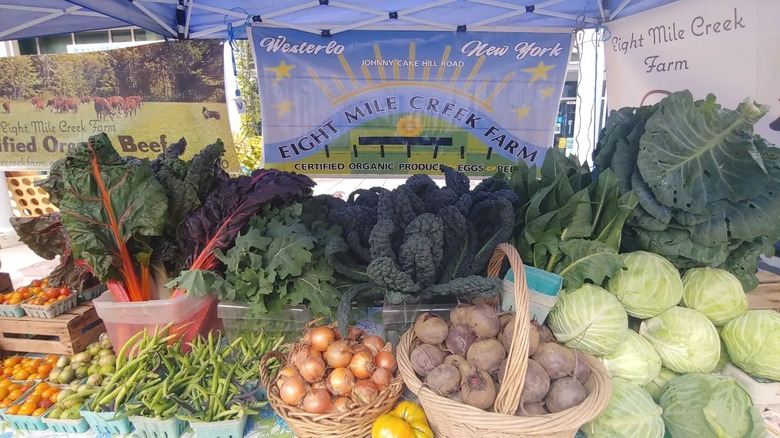 Eight Mile Creek Farm vegetable stand at farmers' market