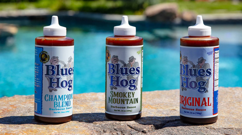 Blues Hog barbecue sauces by pool