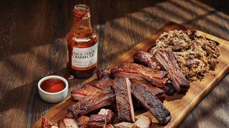 Bottle of Jack Stack barbecue sauce and meats