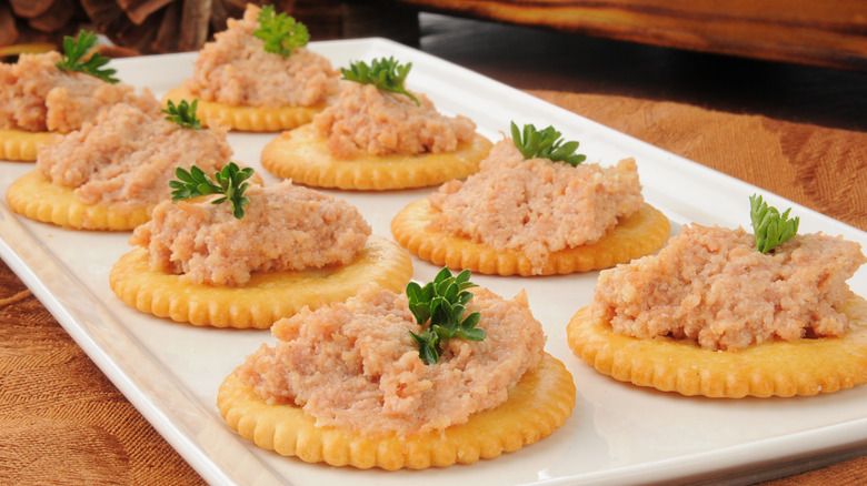 Ritz crackers topped with deviled ham spread