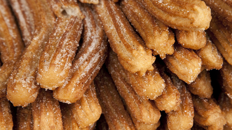 A pile of sugar-coated churros.