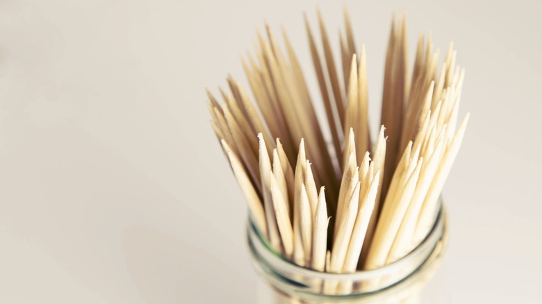 wooden skewers in jar