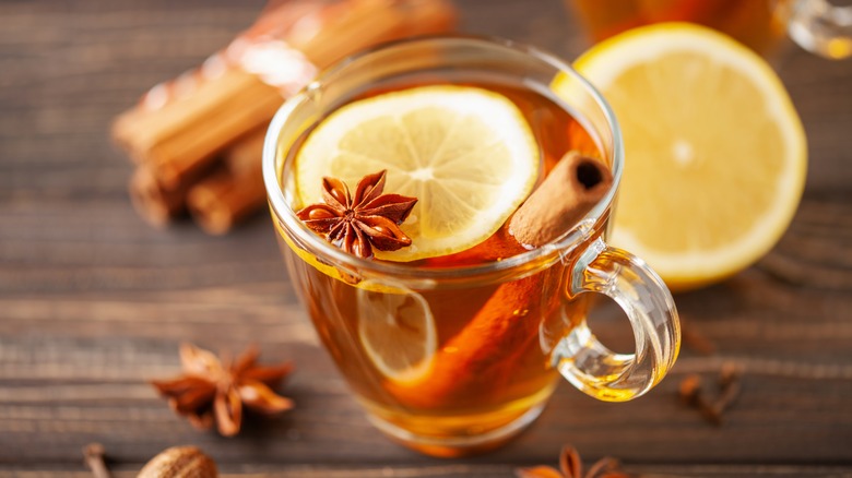 Hot toddy with lemon, cinnamon