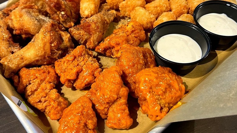 Wings, boneless wings, ranch dressing and tater tots from Buffalo Wild Wings