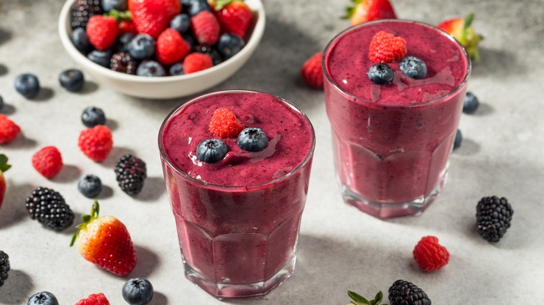 Berry smoothies in glass cups