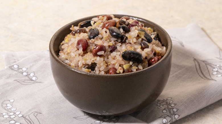 bowl of red beans and rice on napkin