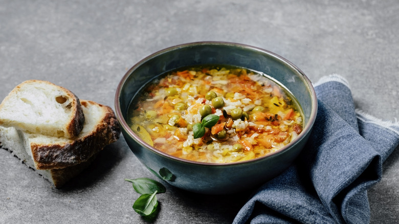 Bowl of vegetable soup with bread