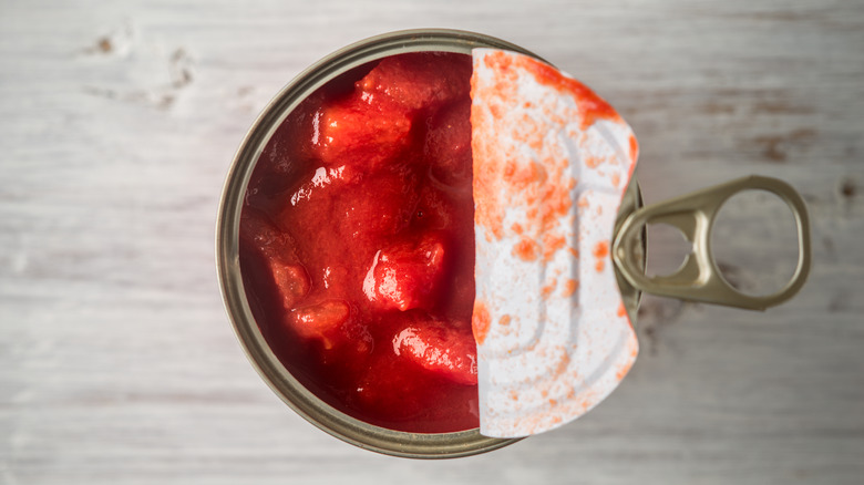 overview of half-opened canned tomatoes