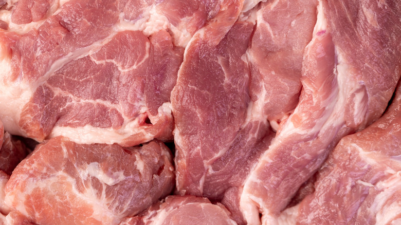 A close up photo of raw pork meat