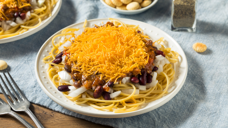 a plate of Cincinnati chili over spaghetti