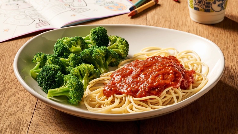 Olive Garden kids' spaghetti accompanied by broccoli