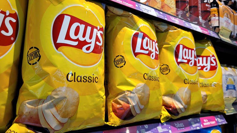 Lay's classic potato chip bags on shelf