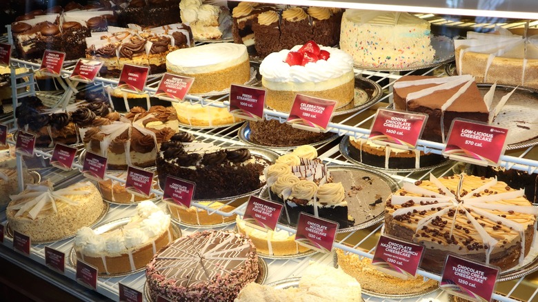 Some of the many cheesecakes offered by The Cheesecake Factory, on display.