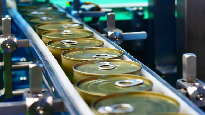 warehouse conveyer belt with cans