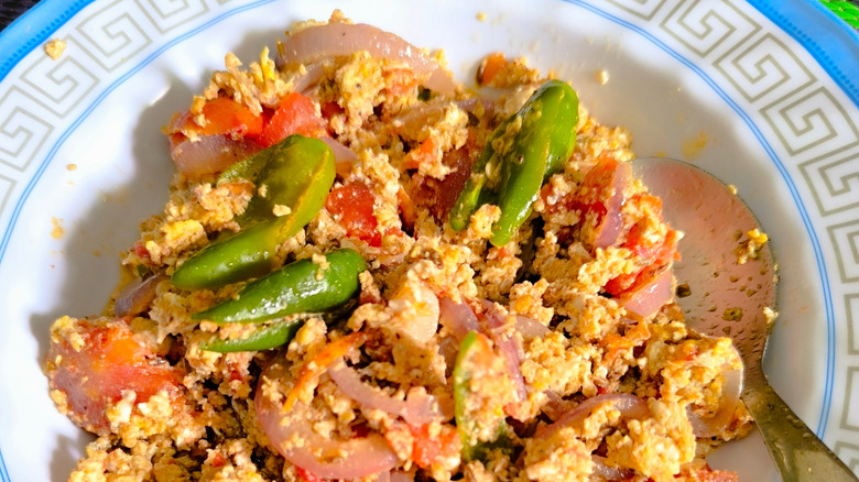 Scrambled eggs with tomatoes, onions, and green chilies