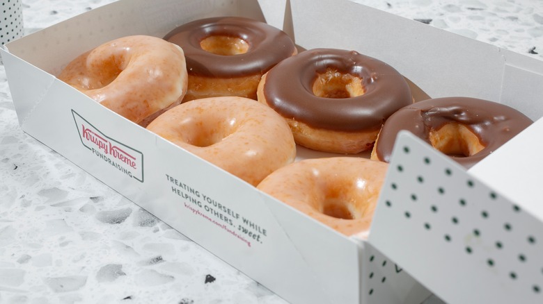 A box of Krispy Kreme Original Glazed and Chocolate Iced donuts