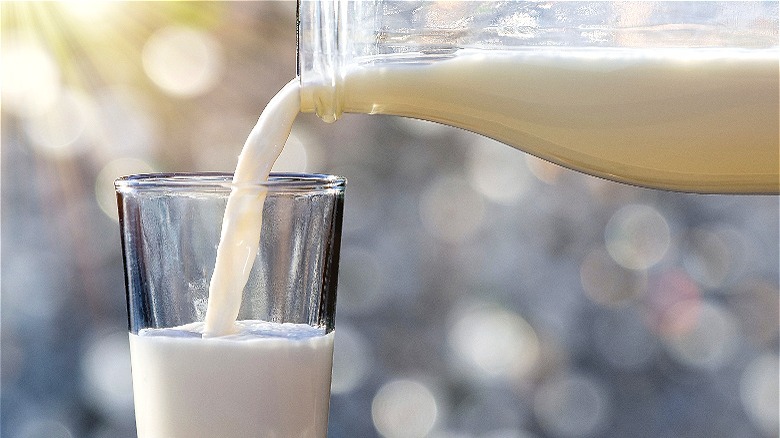 Milk being poured into a glass