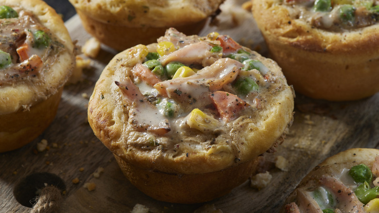 Chicken pot pies on a cutting board