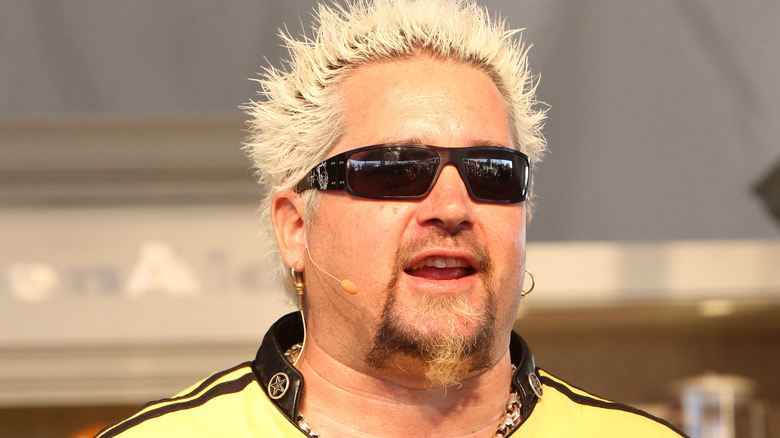 guy fieri yellow shirt sunglasses