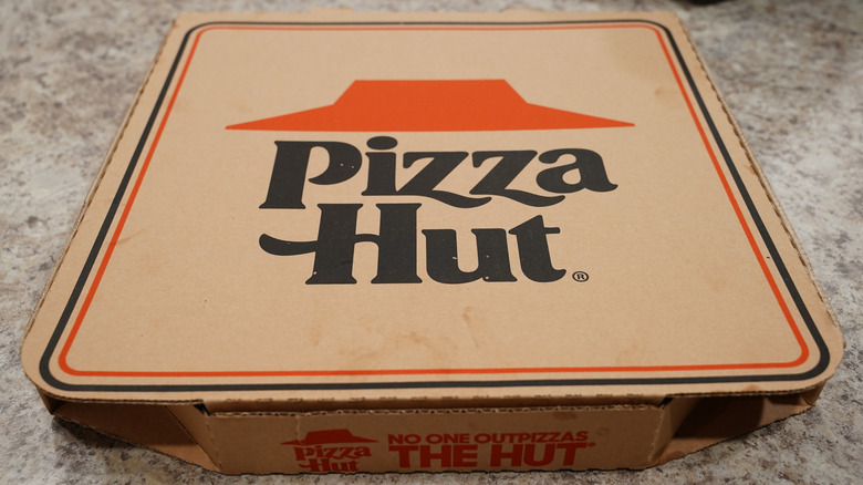 A Pizza Hut pizza to-go box