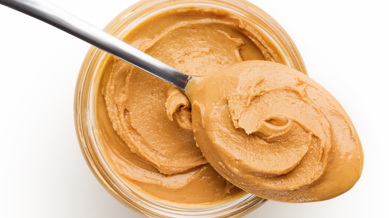 jar of peanut butter with spoon