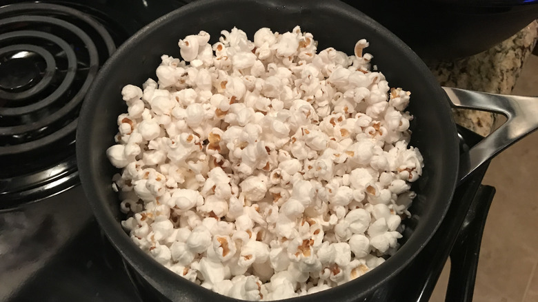 popcorn in a frying pan on the stove