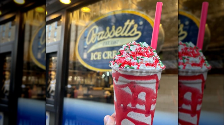 Bassetts Ice Cream in front of store sign