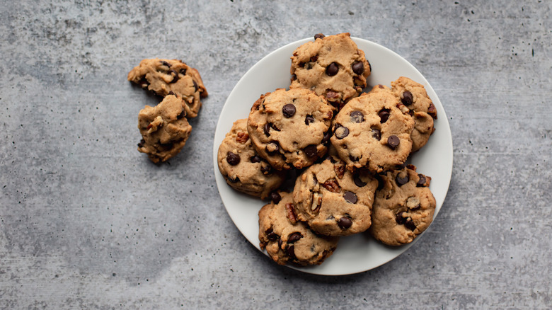 Plate of chocolate chip cookies with pecans