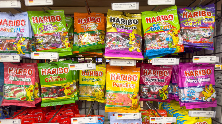 Packets of Haribo sweets in a store.