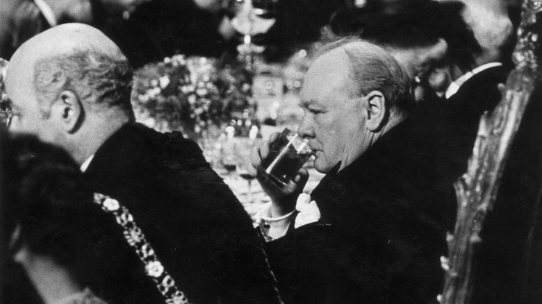 Winston Churchill sipping whiskey