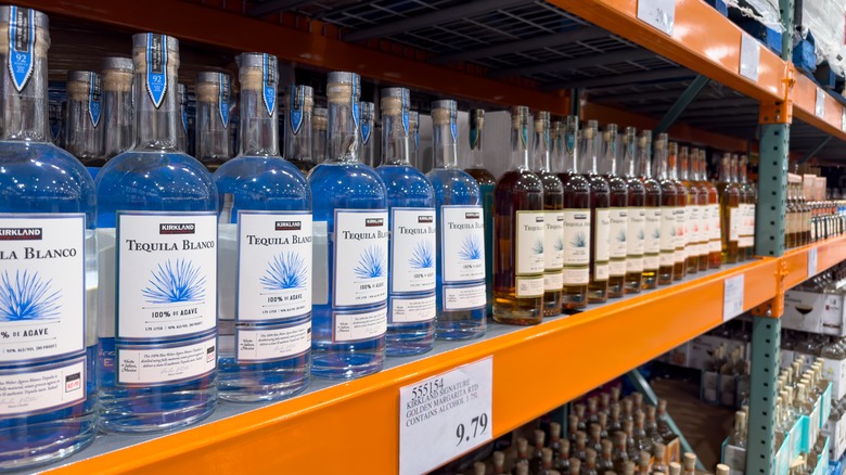 Shelf of Kirkland Signature branded tequila