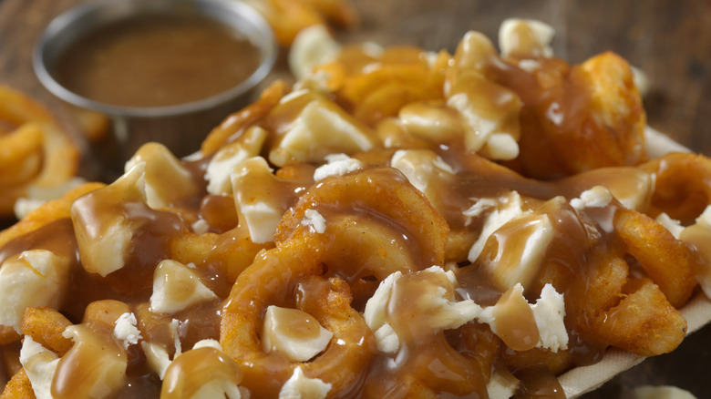 Curly fry poutine with cheese curds and gravy.