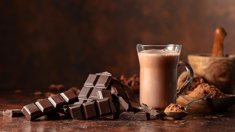 Chocolate milk pouring into a glass