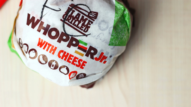 Overhead image of wrapped up Whopper