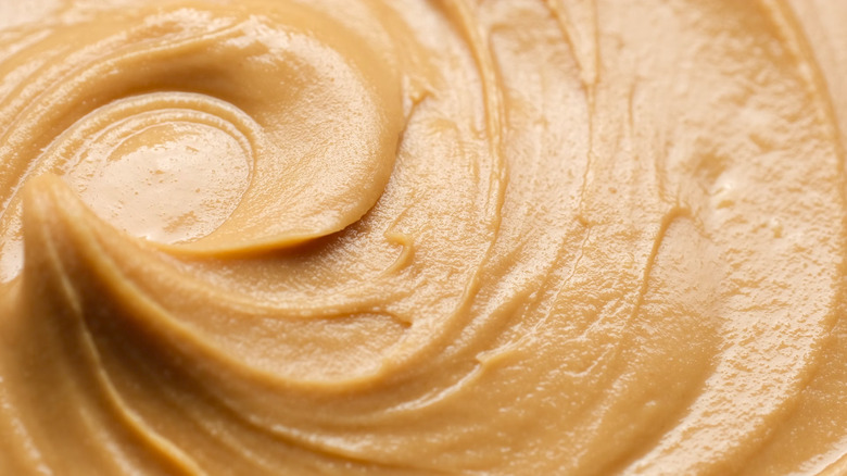 close up of peanut butter swirled to the left