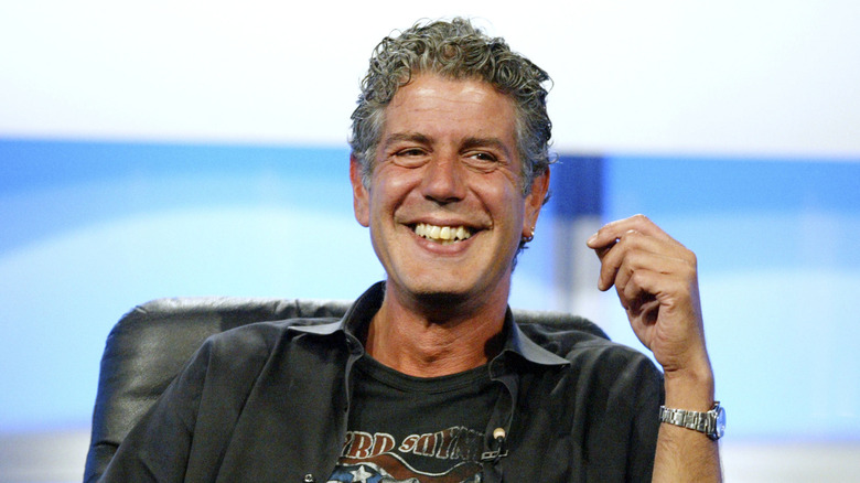 Anthony Bourdain smiling during an interview.