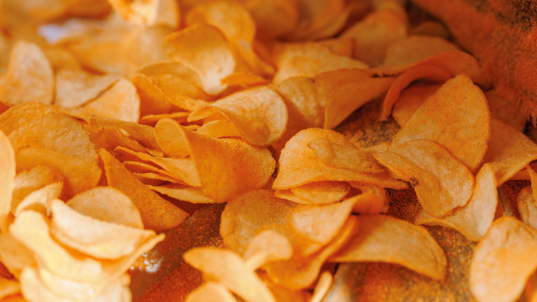 an assortment of crispy, seasoned potato chips