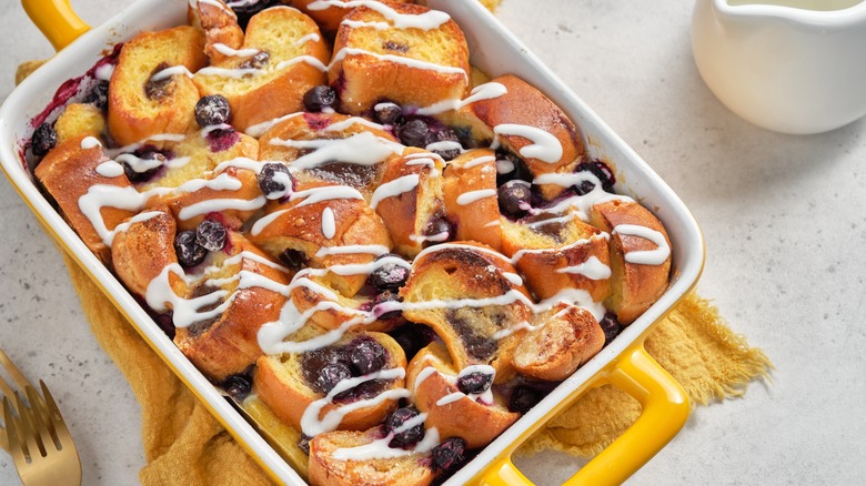 French toast bake in yellow and white casserole dish