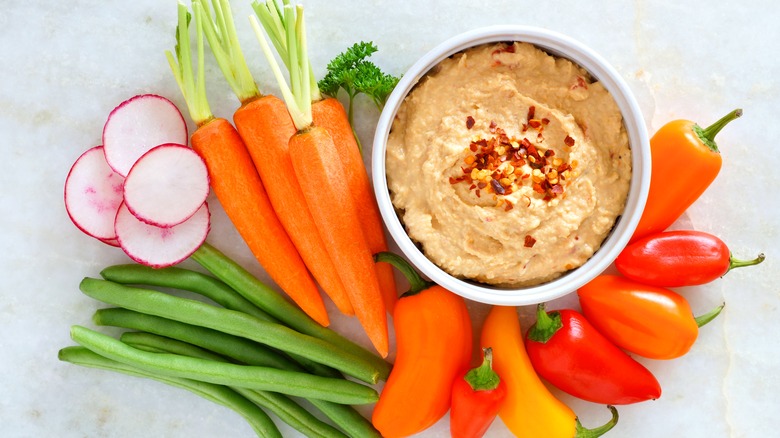 Hummus dish and vegetables