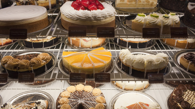 Multiple types of cheesecakes at a Cheesecake Factory