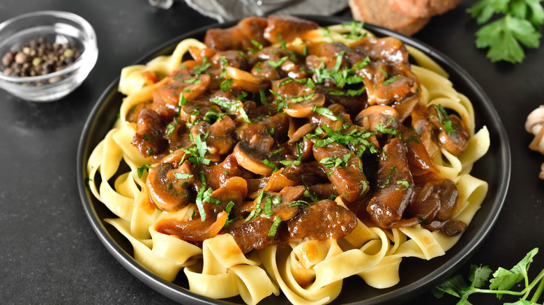 Plate of beef Stroganoff over noodles