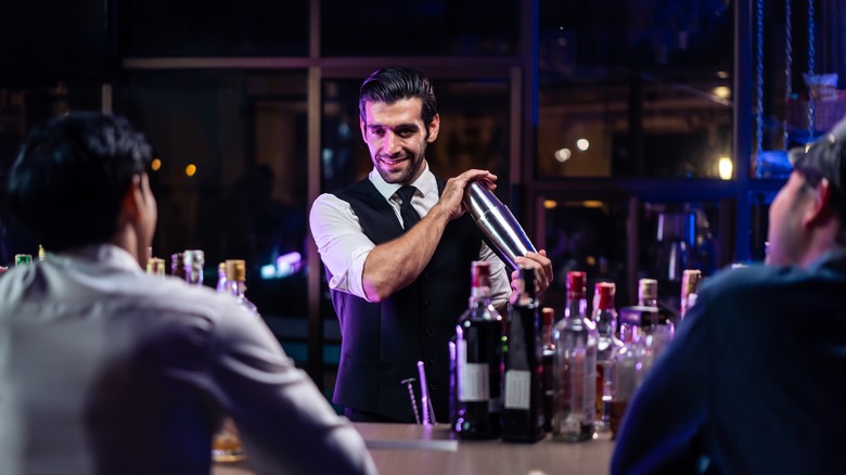 Bartender working at a bar