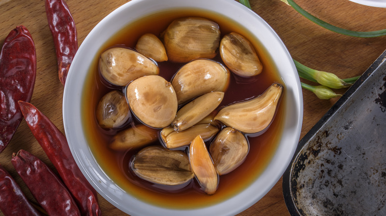 Bowl of pickled garlic