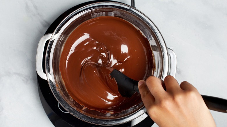 Melting and stirring chocolate