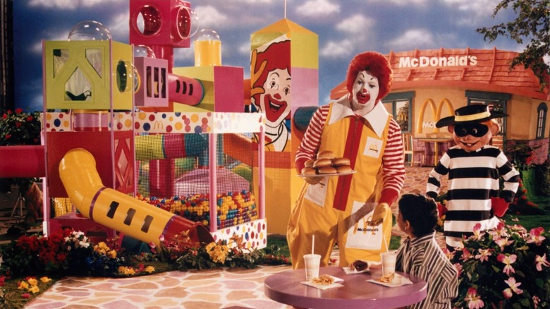 Ronald McDonald enjoys lunch at a McDonald's playground