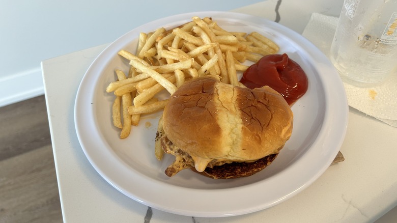 McDonald's McCrispy sandwich with fries and ketchup on the side