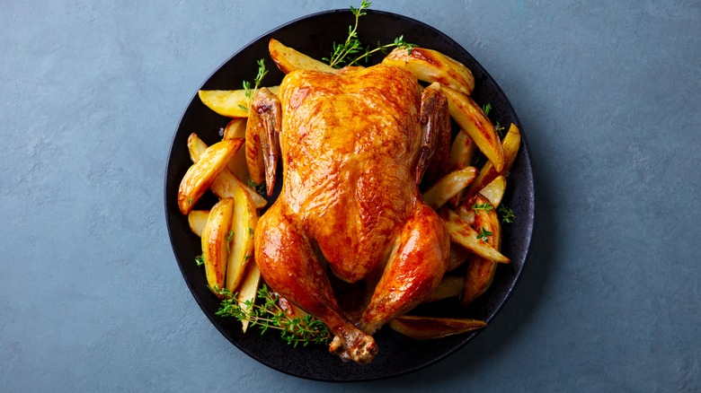 Golden roast chicken and potatoes