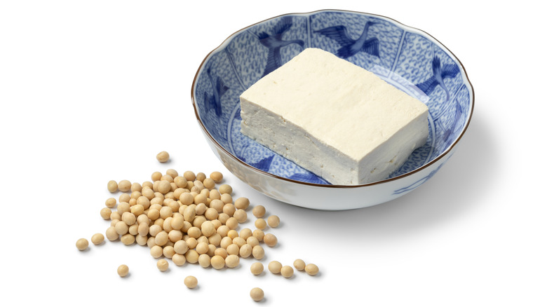 Decorative bowl of tofu and soy beans