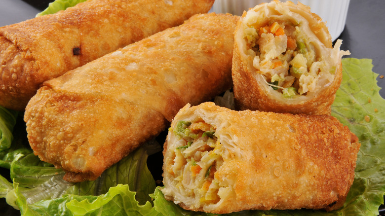 egg rolls on lettuce leaves